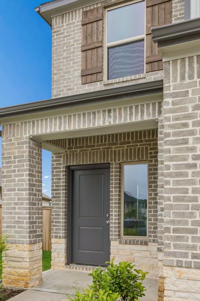 Exterior details and patio area of a home in Riviera Pines, Huffman (Image 3).