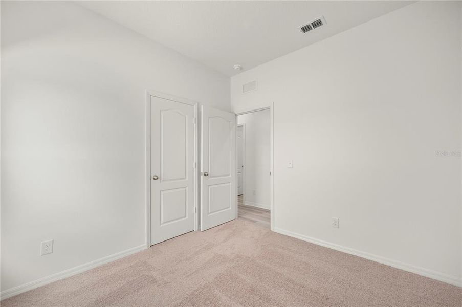 Spacious, unfurnished interior of a new home in Gum Lake Preserve, Lake Alfred (Image 11).