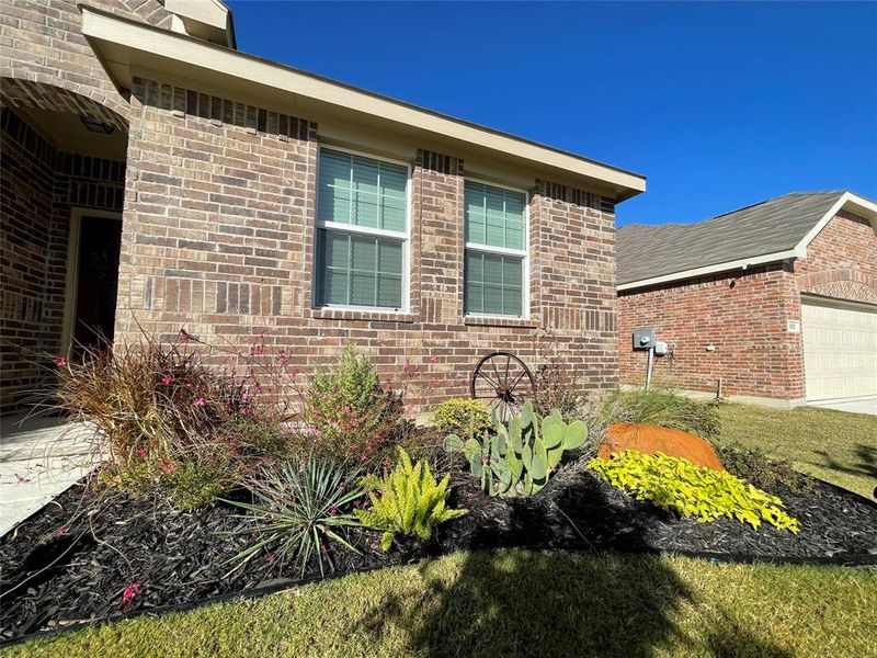 Exterior details and patio area of a home in Reatta Ridge: Classic Collection, Justin (Image 22). Exterior details and patio area of a home in Reatta Ridge: Classic Collection, Justin (Image 22).
