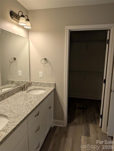 Master Bath Leading into Walk in Closet