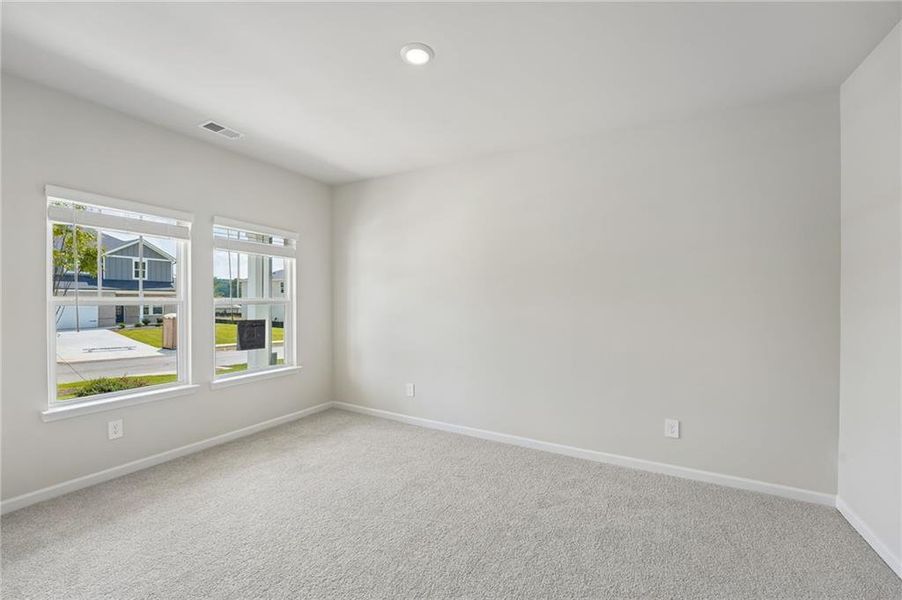 Spacious, unfurnished interior of a new home in Northwoods at Mirror Lake, Villa Rica (Image 37).
