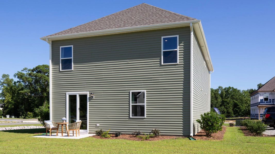 Front exterior of a new home in Surfside Landing, Hubert, NC, highlighting curb appeal (Image 19).