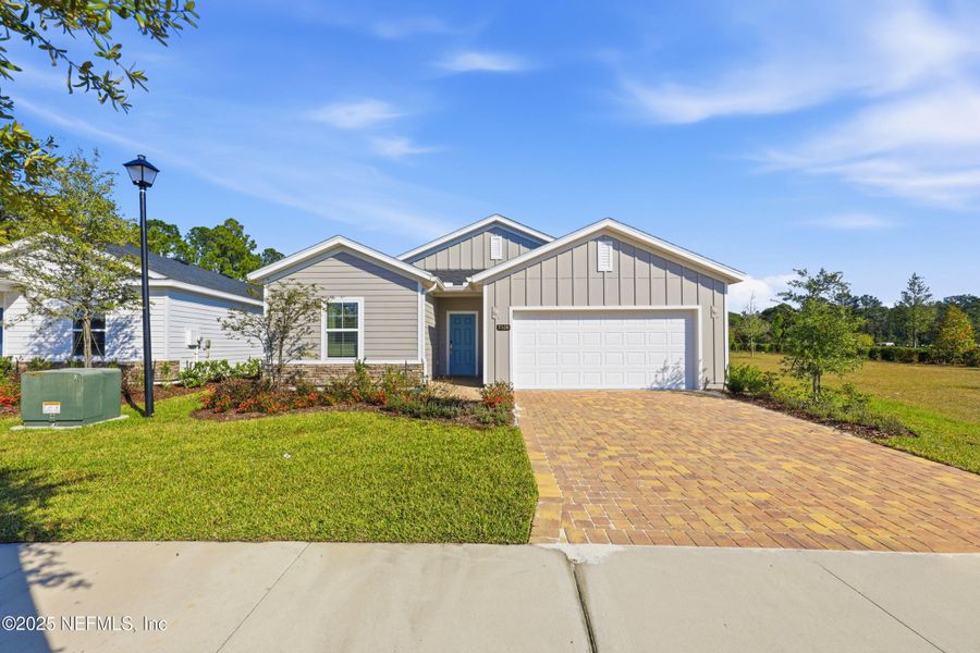 Front exterior of a new home in , Green Cove Springs, FL, highlighting curb appeal (Image 2). Front exterior of a new home in , Green Cove Springs, FL, highlighting curb appeal (Image 2).