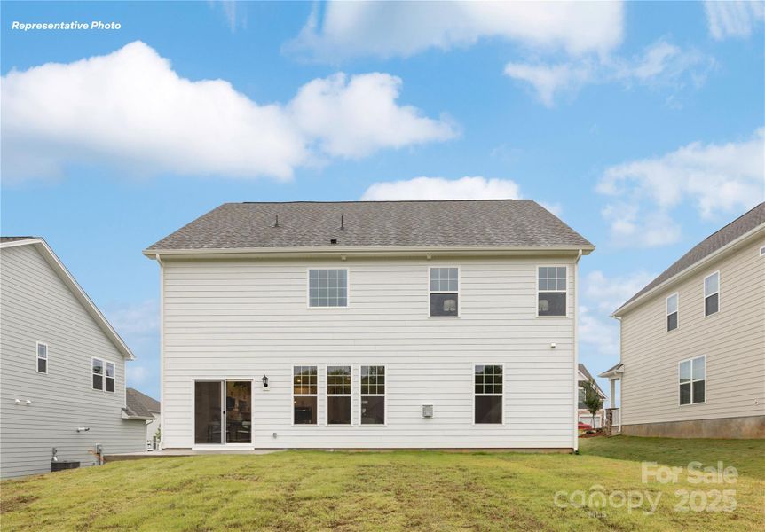 Front exterior of a new home in Oak Grove Hill, Huntersville, NC, highlighting curb appeal (Image 1).