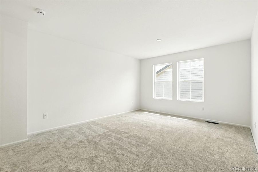 Spacious, unfurnished interior of a new home in Windsong, Thornton (Image 28).