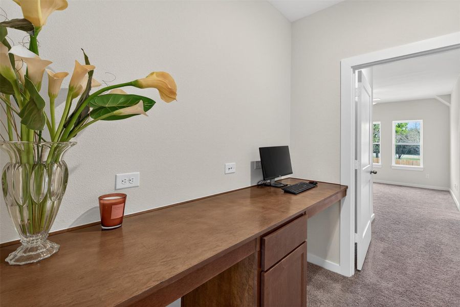 Convenient built-in workspace offering a dedicated area for remote work, study, or household organization. Convenient built-in workspace offering a dedicated area for remote work, study, or household organization.