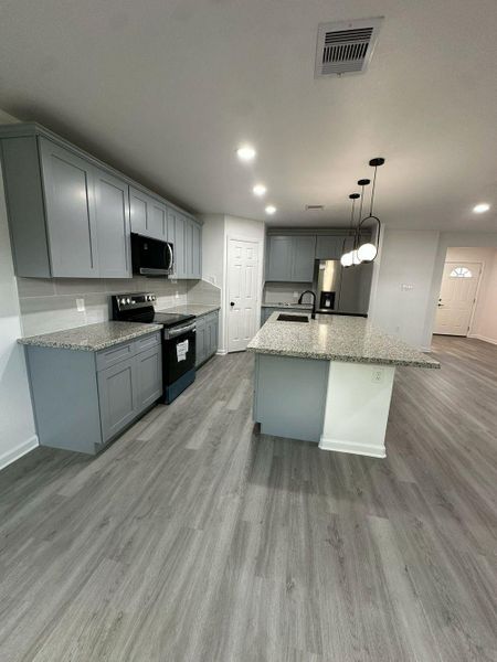 Furnished interior view inside a new home in , Houston (Image 4). Furnished interior view inside a new home in , Houston (Image 4).