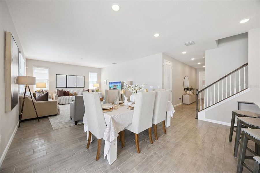 Furnished interior view inside a new home in Seasons at The Grove, Mascotte (Image 11).