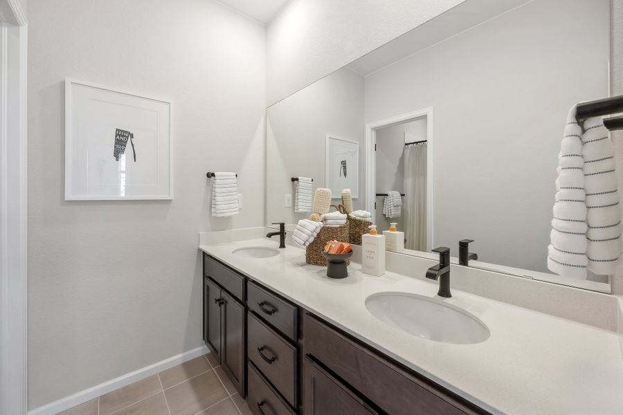 Representative furnished interior of a home built from the 2503 by Risewell Homes in Harvest Crossing, Aurora (Image 20).
