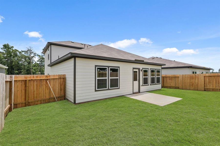 Exterior details and patio area of a home in Crockett Meadows, Conroe (Image 4). Exterior details and patio area of a home in Crockett Meadows, Conroe (Image 4).