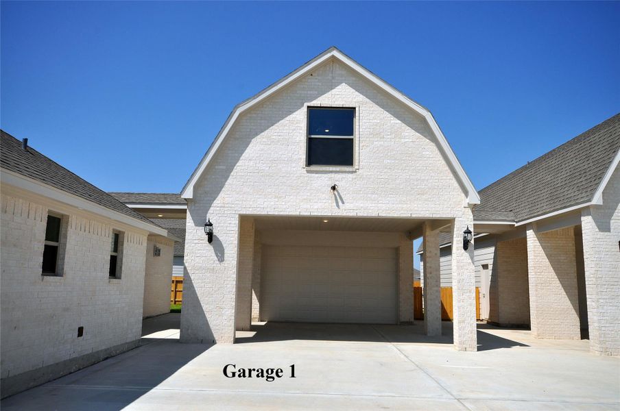 Garage 1 Big Kahuna #1 is a 4 car with a porte cohere and a large finished area above.