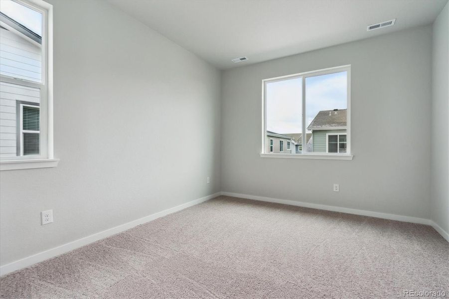 Spacious, unfurnished interior of a new home in Paired Homes at Alder Creek, Parker (Image 23).
