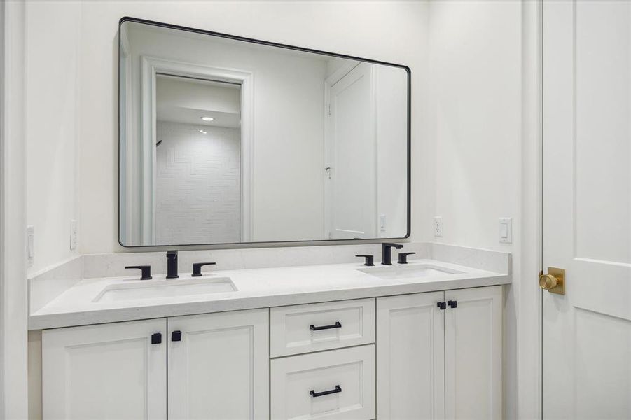 Shared bath connecting bedrooms 2 and 3.