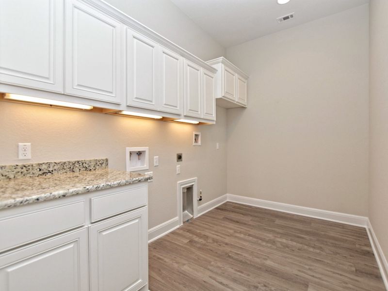 Representative furnished interior of a home built from the Siena III by Giddens Homes in Clearwater Ranch, Liberty Hill (Image 127).