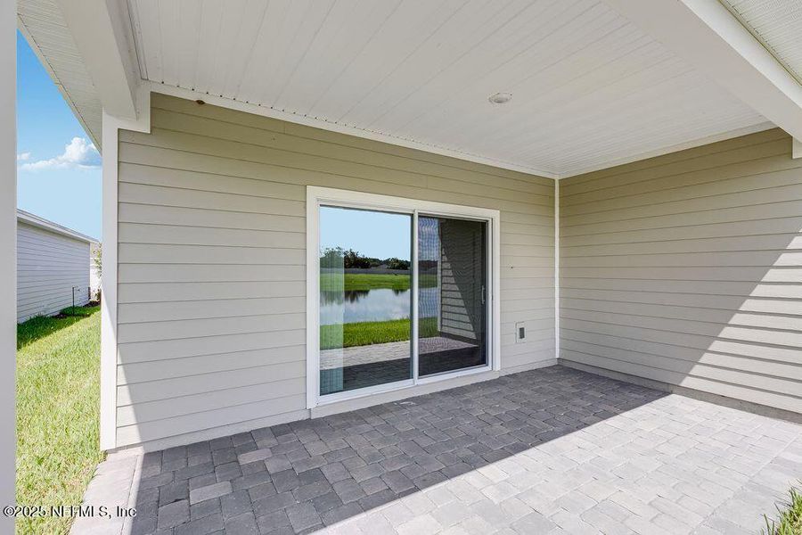 Front exterior of a new home in Coopers Meadow, Jacksonville, FL, highlighting curb appeal (Image 1). Front exterior of a new home in Coopers Meadow, Jacksonville, FL, highlighting curb appeal (Image 1).