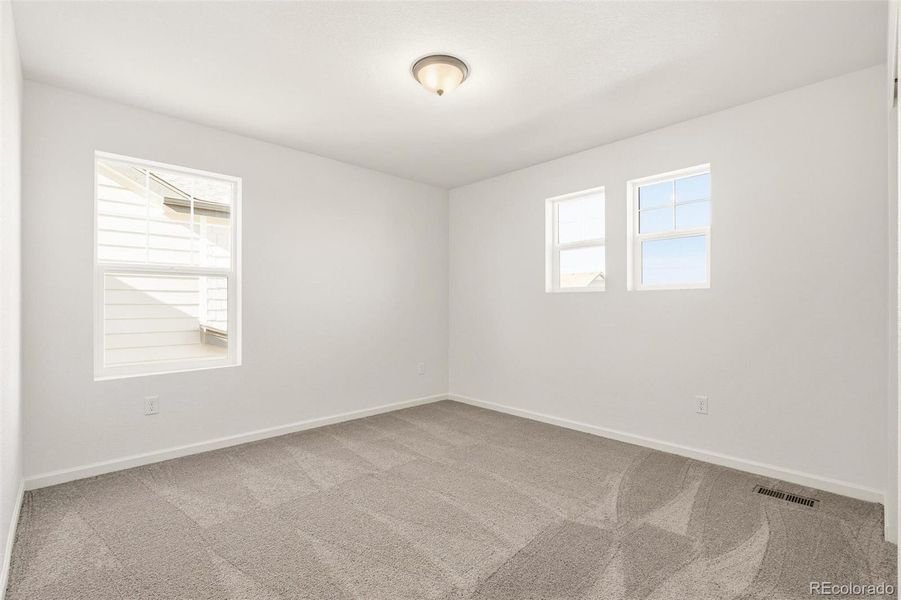 Spacious, unfurnished interior of a new home in Farmlore, Brighton (Image 27).