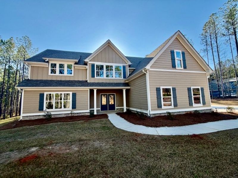 Front exterior of a new home in Dove Creek, LaGrange, GA, highlighting curb appeal (Image 19).