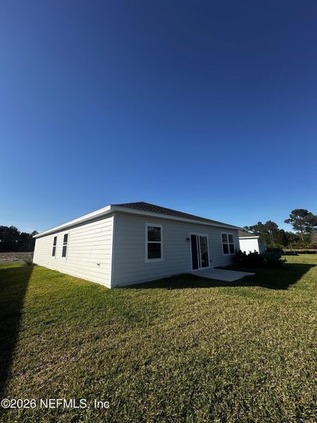 Exterior details and patio area of a home in , Palm Coast (Image 3). Exterior details and patio area of a home in , Palm Coast (Image 3).