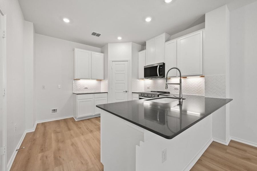 Furnished interior view inside a new home in Creekside at Estancia, Austin (Image 5).