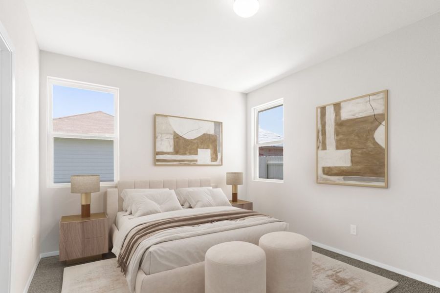 Image of staged primary bedroom with beige modern walls decor and queen sized bed with a beige bed frame and side tables with lamps