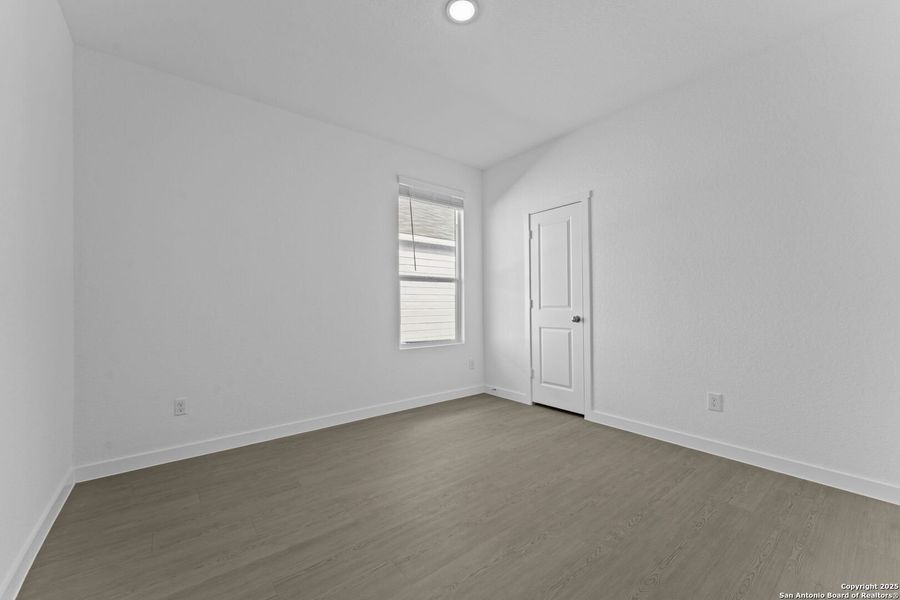 Spacious, unfurnished interior of a new home in Waterwheel: Coastline Collection, San Antonio (Image 22).