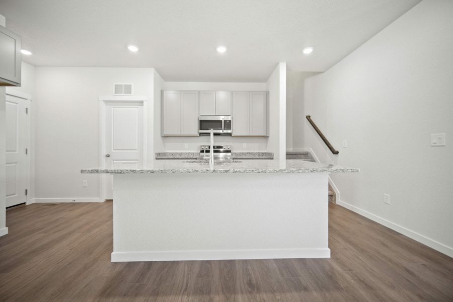 Representative furnished interior of a home built from the Manitou by View Homes in Aspen Meadows – Townhomes, Colorado Springs (Image 7). Representative furnished interior of a home built from the Manitou by View Homes in Aspen Meadows – Townhomes, Colorado Springs (Image 7).