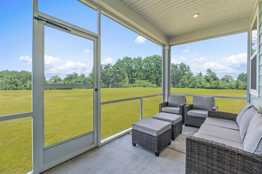 Exterior details and patio area of a home in Sea Trail, Sunset Beach (Image 2).