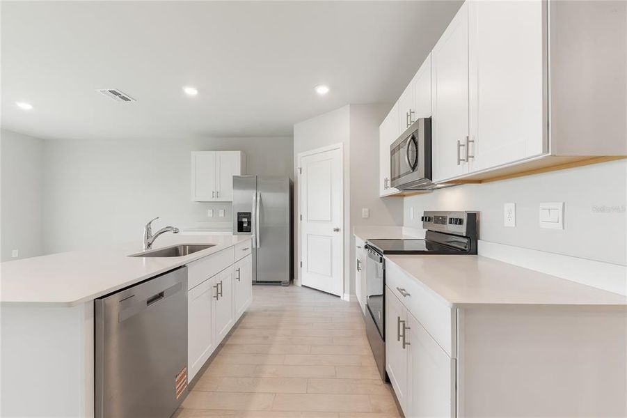 Furnished interior view inside a new home in Burnt Store Village, Punta Gorda (Image 5). Furnished interior view inside a new home in Burnt Store Village, Punta Gorda (Image 5).