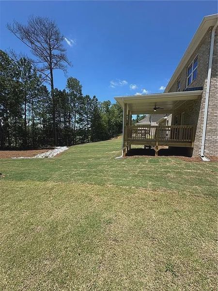 Exterior details and patio area of a home in Mirror Lake at South Harbour, Villa Rica (Image 19).