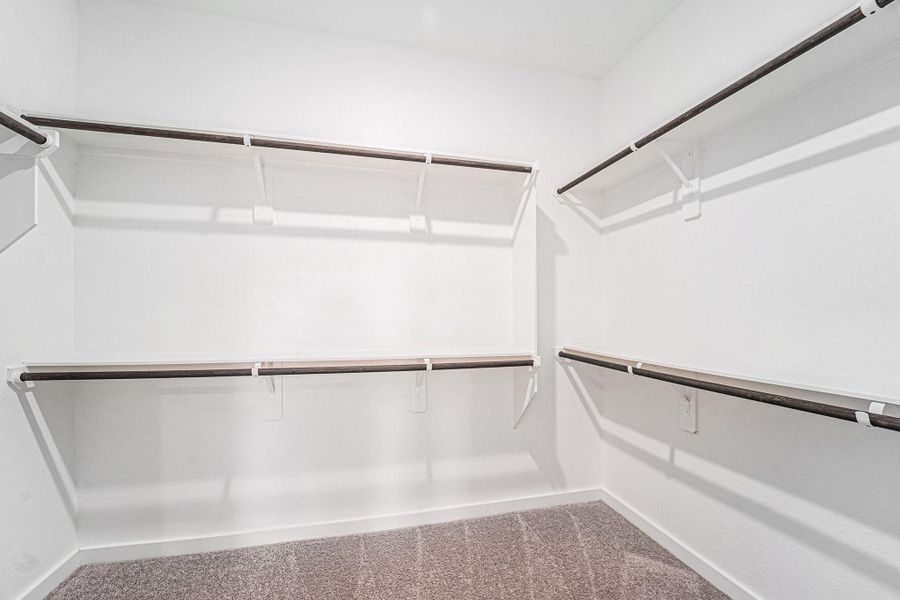 This expansive primary closet is the perfect size This expansive primary closet is the perfect size