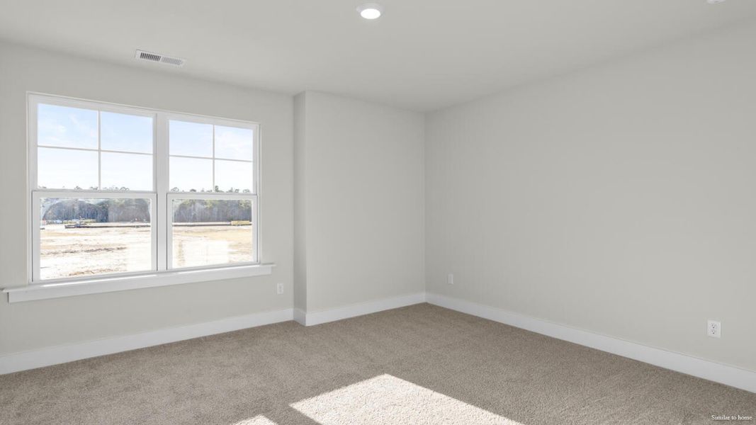 Spacious, unfurnished interior of a new home in The Haven at Indigo Preserve, Leland (Image 46).