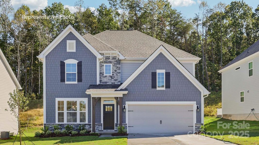 Front exterior of a new home in Sanctuary at Southgate, Indian Trail, NC, highlighting curb appeal (Image 1).