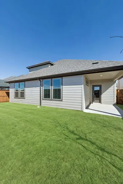 Covered Patio in the Wimbledon home plan by Trophy Signature Homes – REPRESENTATIVE PHOTO