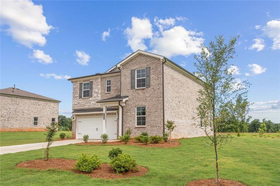 Front exterior of a new home in Walker Grove, McDonough, GA, highlighting curb appeal (Image 19).