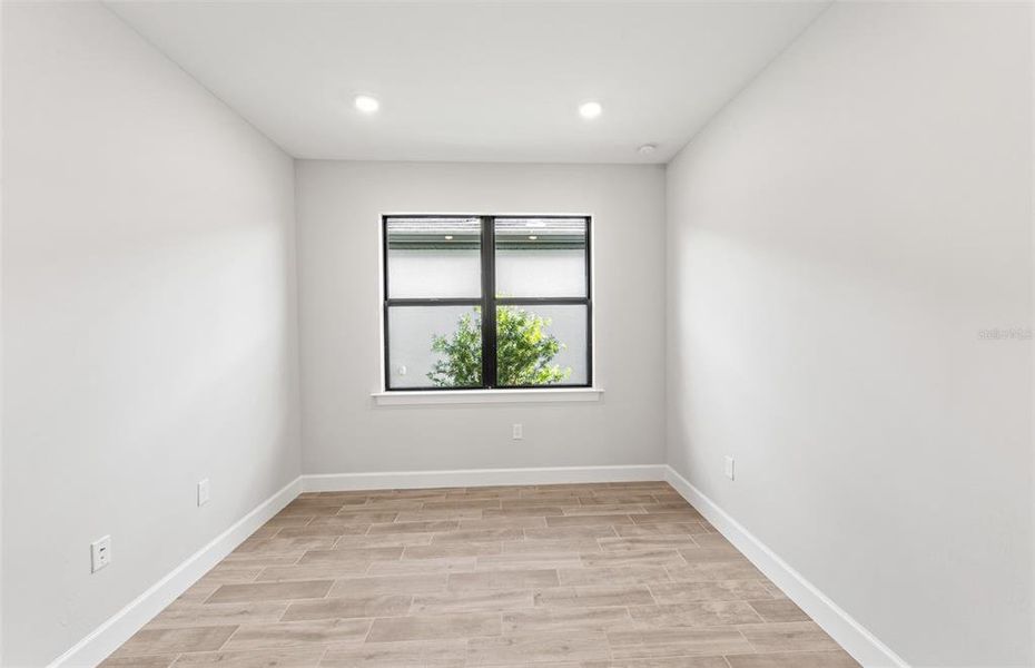 Spacious, unfurnished interior of a new home in Arbor Oaks, North Port (Image 26). Spacious, unfurnished interior of a new home in Arbor Oaks, North Port (Image 26).