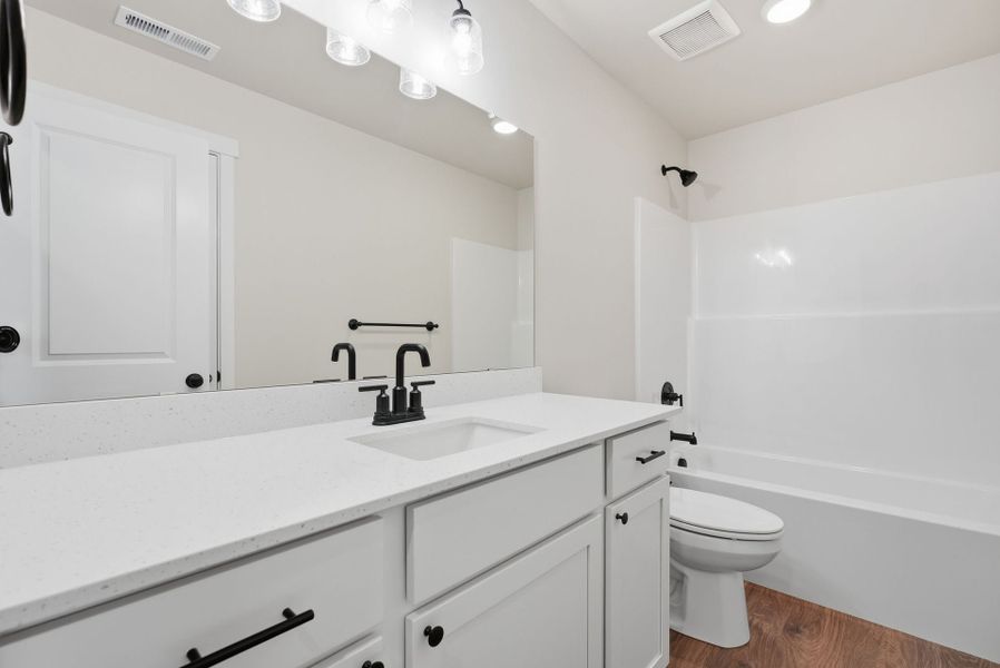 Representative furnished interior of a home built from the Laurel by MonteVista Homes in IronHorse, Prineville (Image 12).