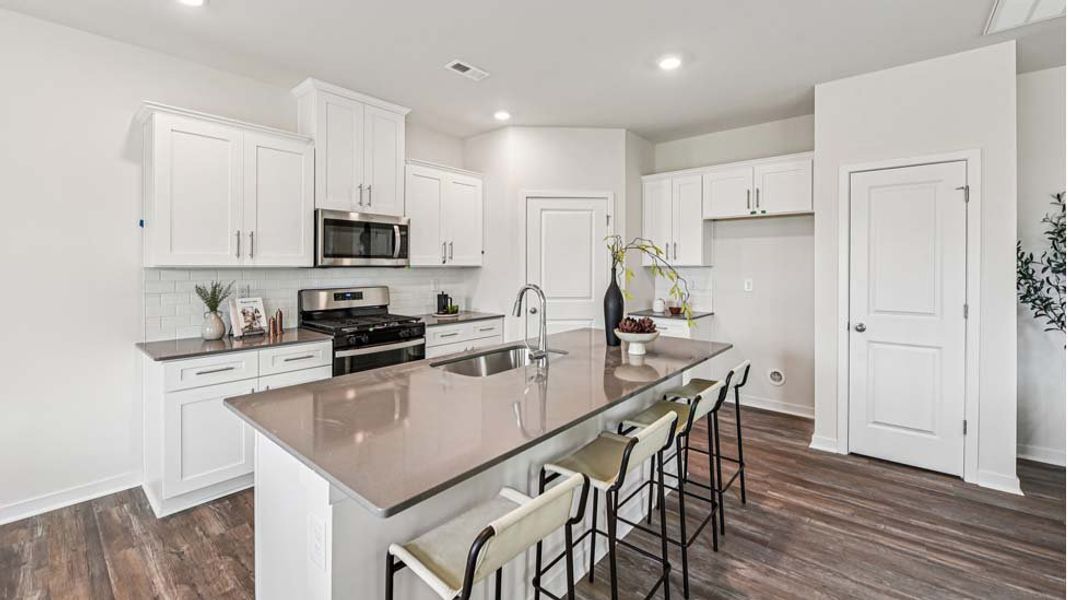 Representative furnished interior of a home built from the Darwin by D.R. Horton in Reedy Creek Preserve, Charlotte (Image 11).