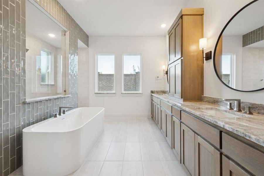 Our Stella floor plan offers our signature owner's bath featuring double, walk through shower with drying areas!
