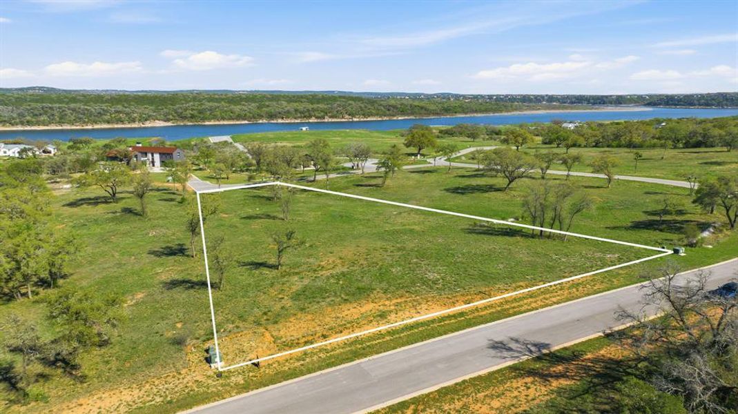 A spacious lot with prime lake views, ready for your custom home.