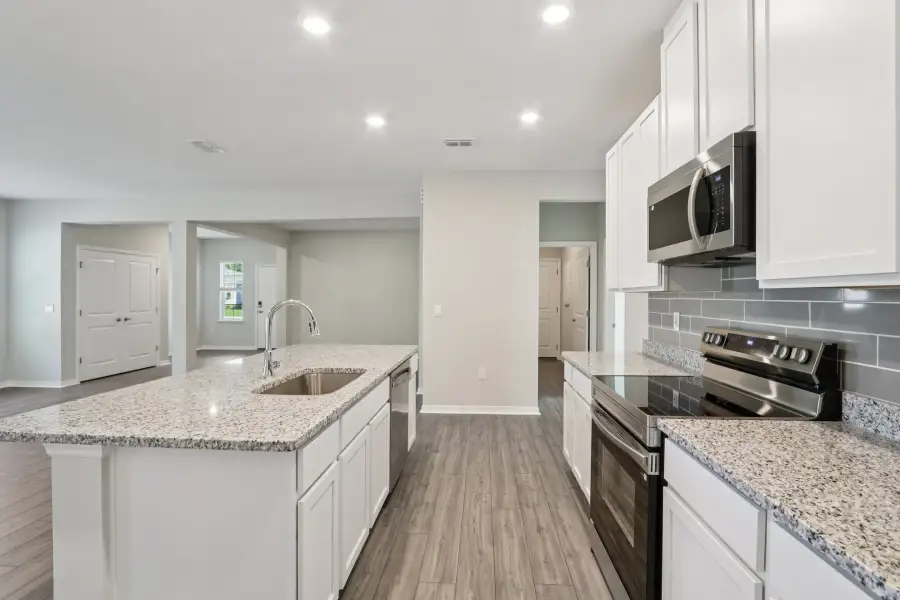 Representative furnished interior of a home built from the Ashton by Maronda Homes in Highland Park, Newberry (Image 6). Representative furnished interior of a home built from the Ashton by Maronda Homes in Highland Park, Newberry (Image 6).