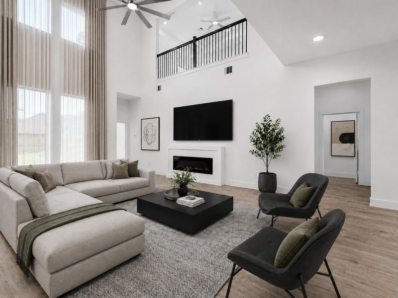 Wood-look tile flooring and a modern electric fireplace anchor this stylish living room. (Virtually staged) Wood-look tile flooring and a modern electric fireplace anchor this stylish living room. (Virtually staged)