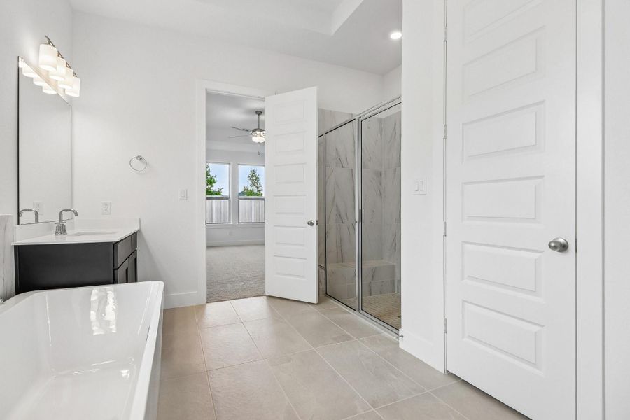 Furnished interior view inside a new home in The Grand Prairie 60', Hockley (Image 13).