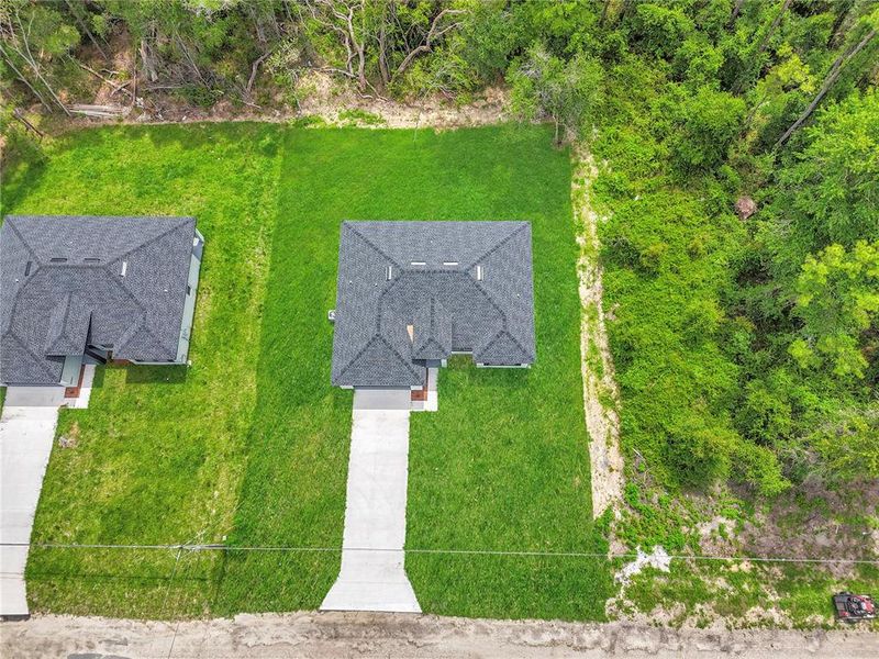 Front exterior of a new home in , Dunnellon, FL, highlighting curb appeal (Image 24).