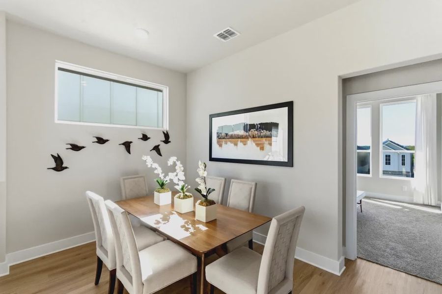 Furnished interior view inside a new home in Centero at Stone Oak, San Antonio (Image 8).