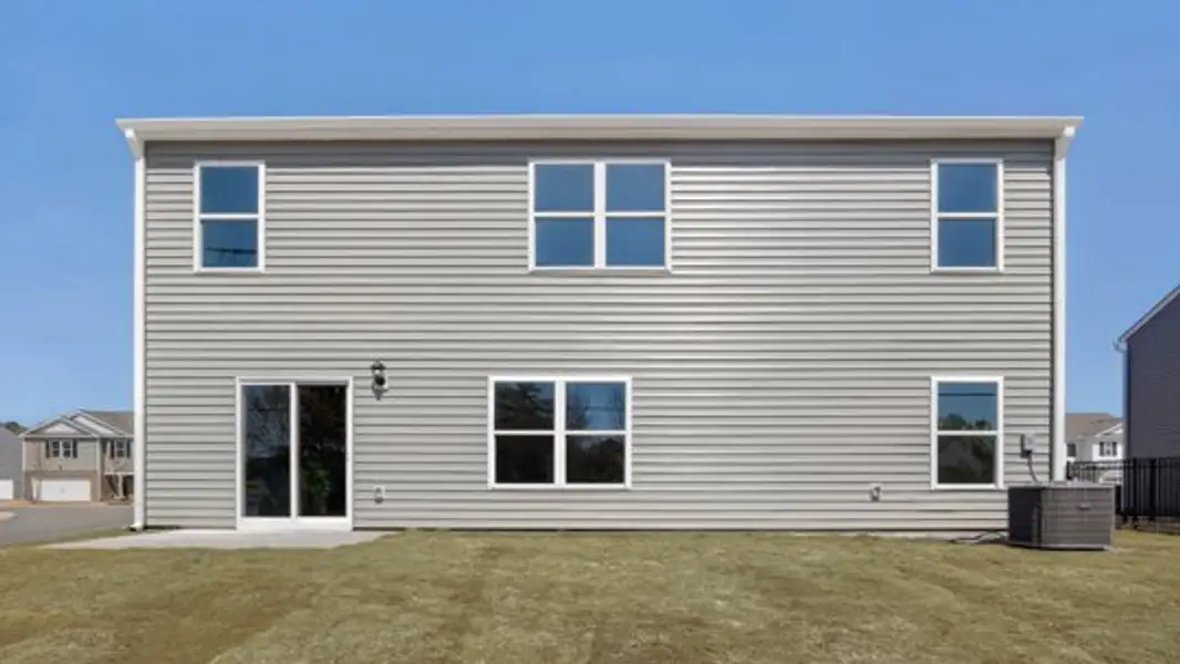 Exterior details and patio area of a home in Wilson's Ridge, Wilson's Mills (Image 3).