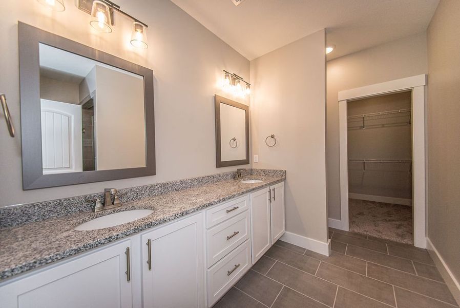 Representative furnished interior of a home built from the Beaumont Elite by Enchanted Homes in Pointe Summit, Slater-Marietta (Image 17).