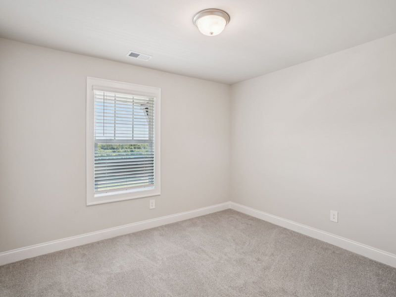 Spacious, unfurnished interior of a new home in Hemingway - Highland Series, Cumming (Image 19).