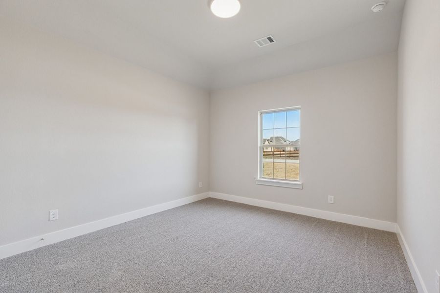 Representative unfurnished interior of a home built from the Halsted by Centre Living Homes in Ellis Ranch Estates, Waxahachie (Image 30).