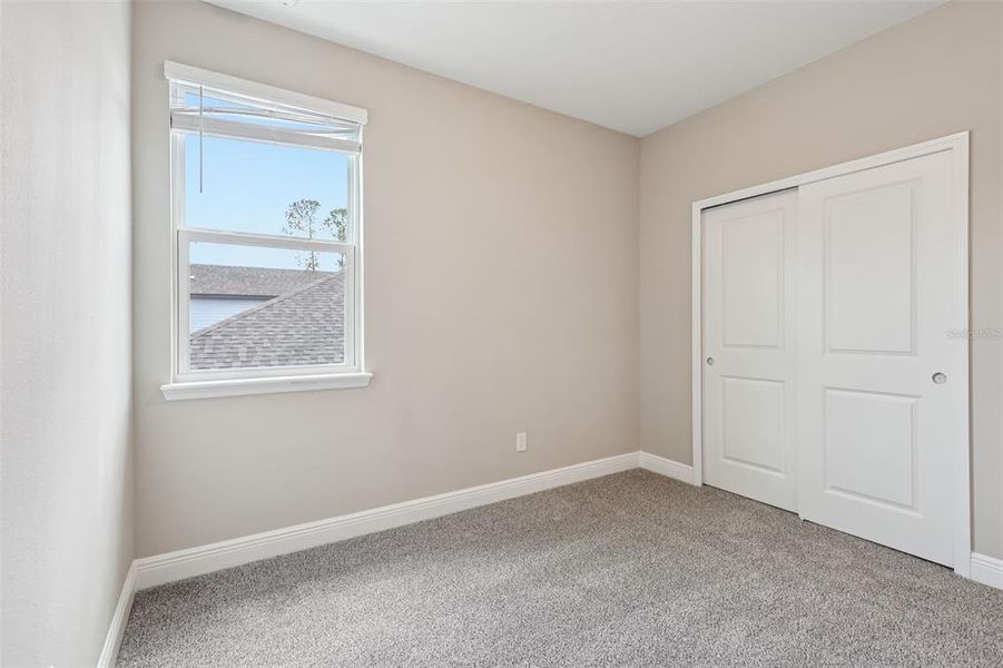 Spacious, unfurnished interior of a new home in Legends Preserve - Signature Series, Daytona Beach (Image 37).