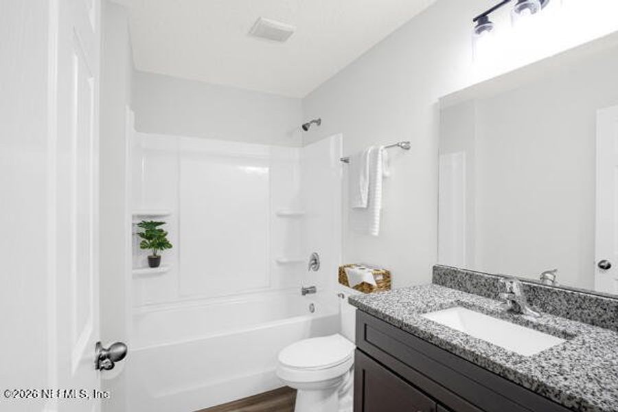 Furnished interior view inside a new home in , Satsuma (Image 9).